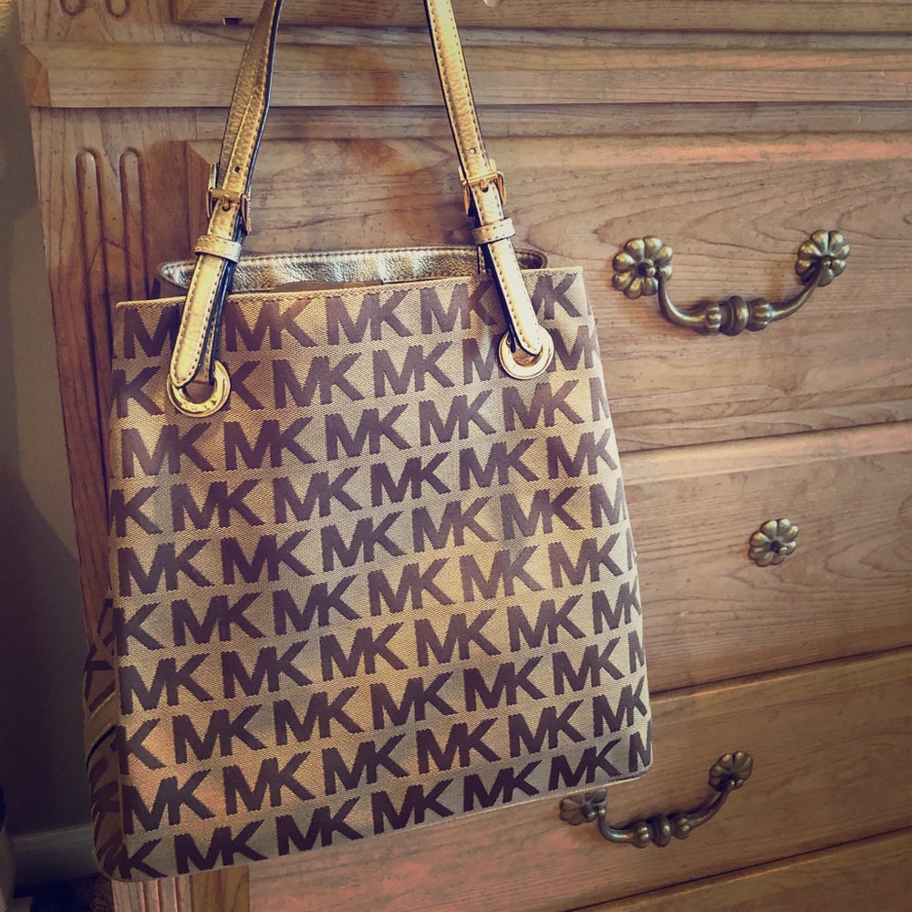 Yellow gold Michael Kors purse